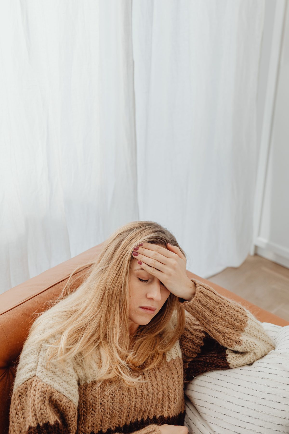 Woman resting at home with fatigue